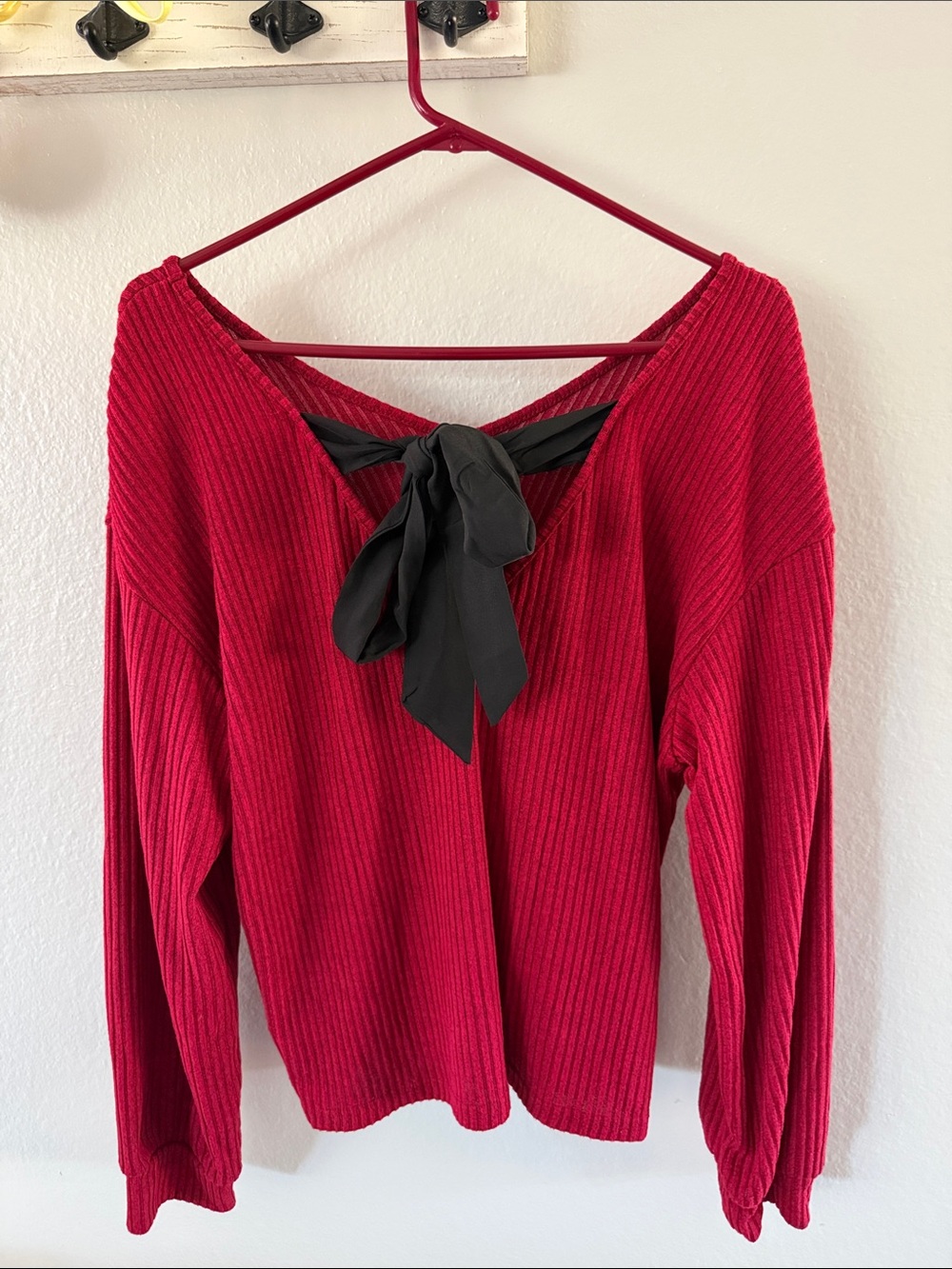 Off-Shoulder Ribbed Sweater with Back Bow in Red